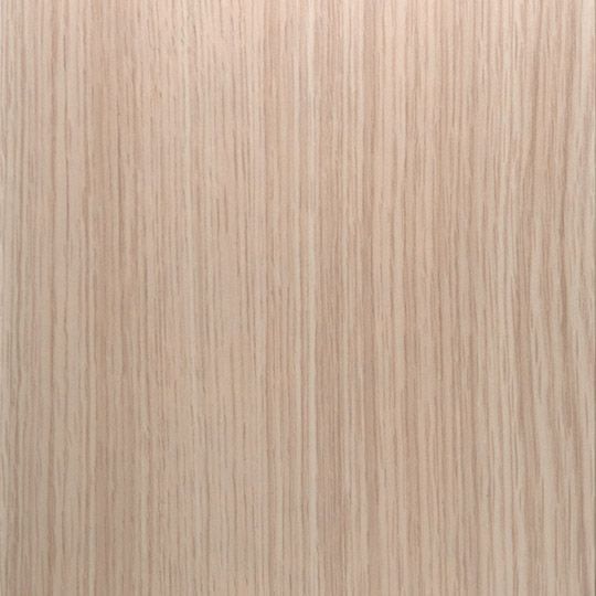 Et nærbillede af et stykke træ, der viser træets struktur.