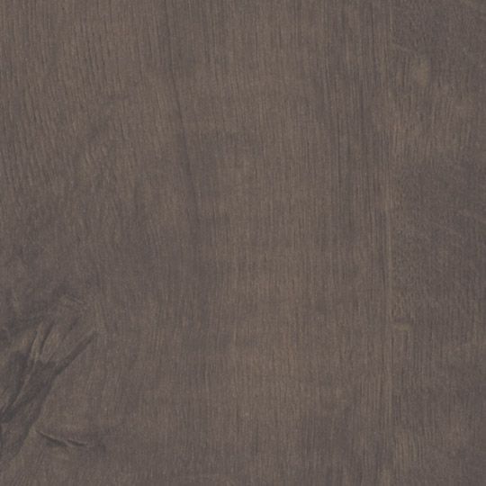 Et nærbillede af et stykke brunt træ.