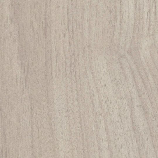 Et nærbillede af et stykke hvidt træ.