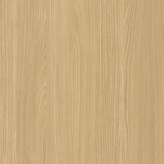 Et nærbillede af et stykke træ, der viser træets struktur.