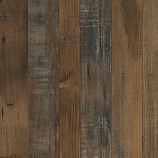 Et nærbillede af et trægulv med åre og tekstur.