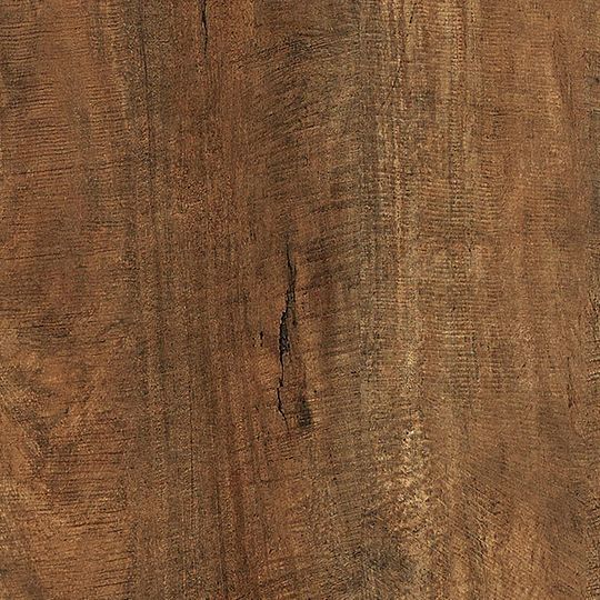 Et nærbillede af et stykke træ, der viser årer og tekstur.