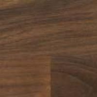 Et nærbillede af et stykke træ, der viser årer og tekstur.