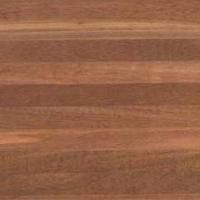 Et nærbillede af et stykke træ, der viser årer og tekstur.