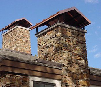Chimneys Repair — Two Chimney with Roof Caps in Lititz, PA