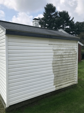 Professional Wall Washing Service — Half dirty and half clean side wall of the house in Lititz, PA