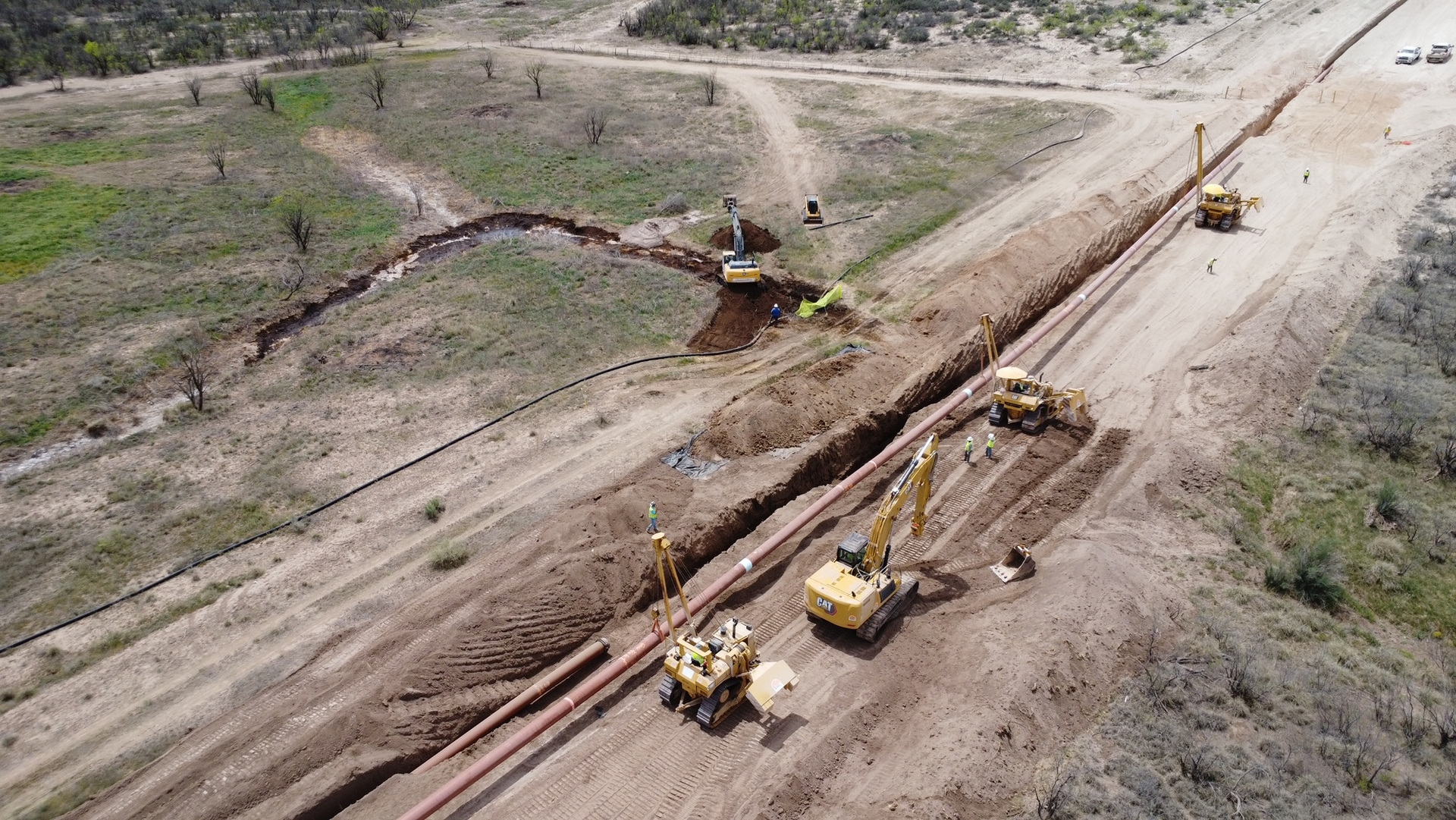 An aerial view of a construction site with a lot of machinery.