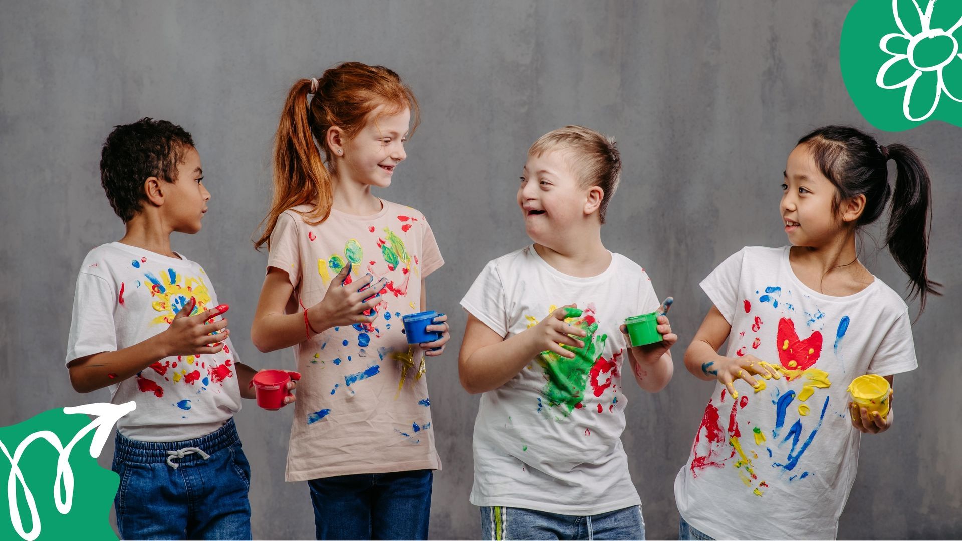 Diverse group of happy children with painted shirts representing the future of NDIS support for children and young people.