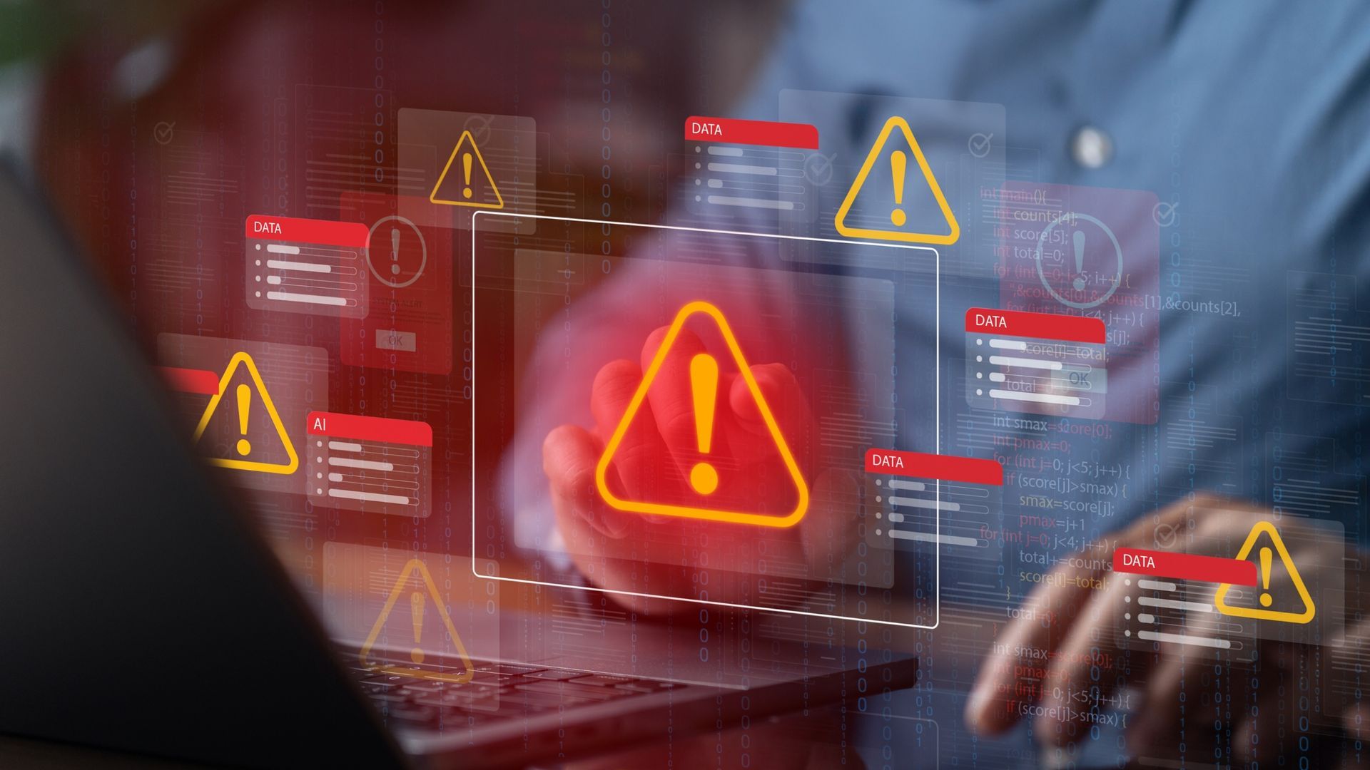 Professional reviewing digital security alerts on a laptop for NDIS fraud and scam prevention in Aus