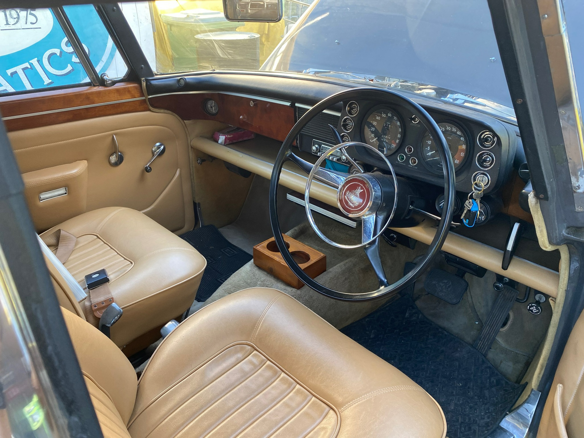 The Interior Of An Old Car With A Steering Wheel And Seats — Town Automatics 4WD & Mechanical in South Townsville, QLD