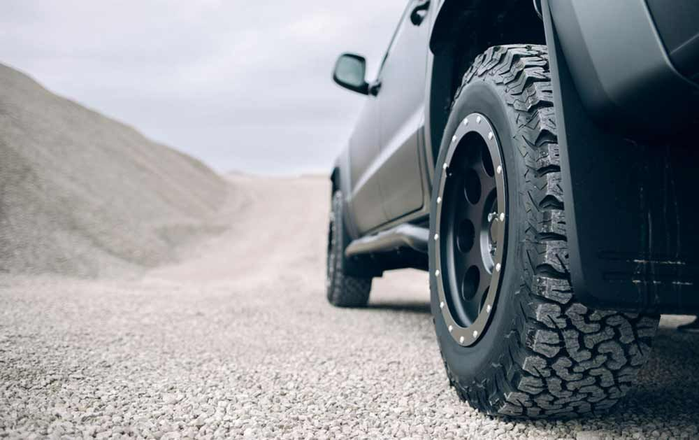 A Close Up Of A Truck's Tire On A Gravel Road β Town Automatics 4WD & Mechanical in South Townsville, QLD