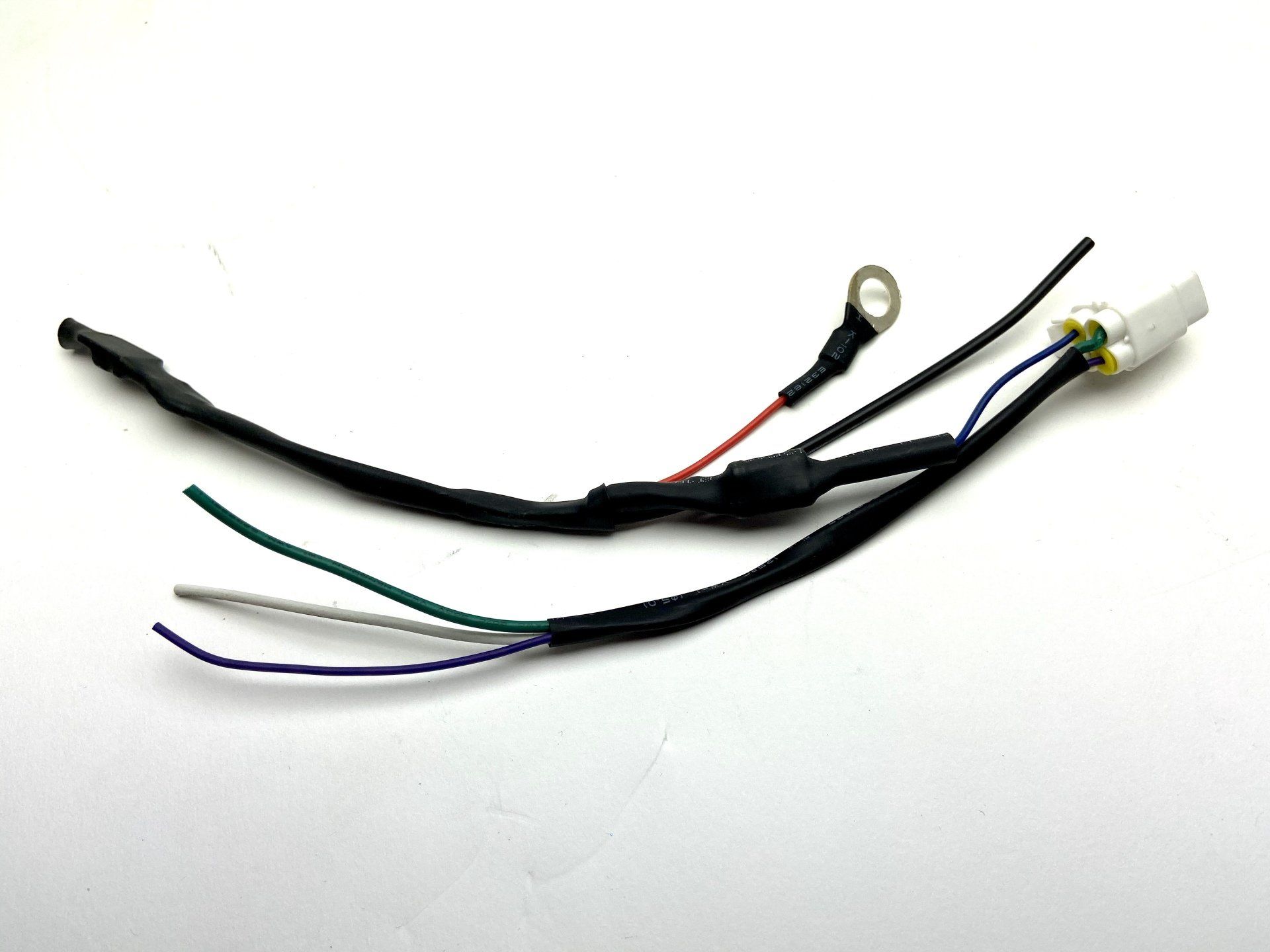 A bunch of wires on a white surface