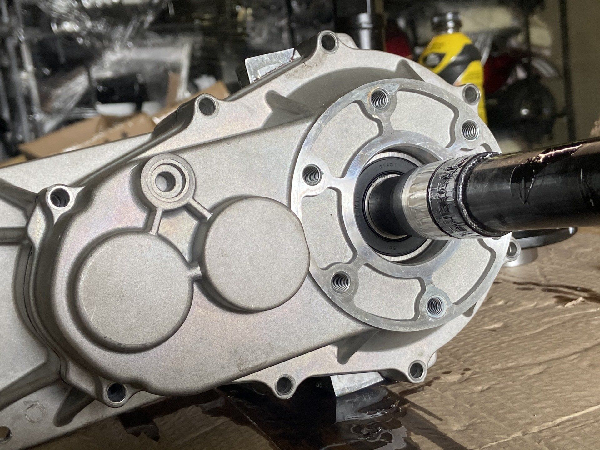 A close up of a gearbox on a table.