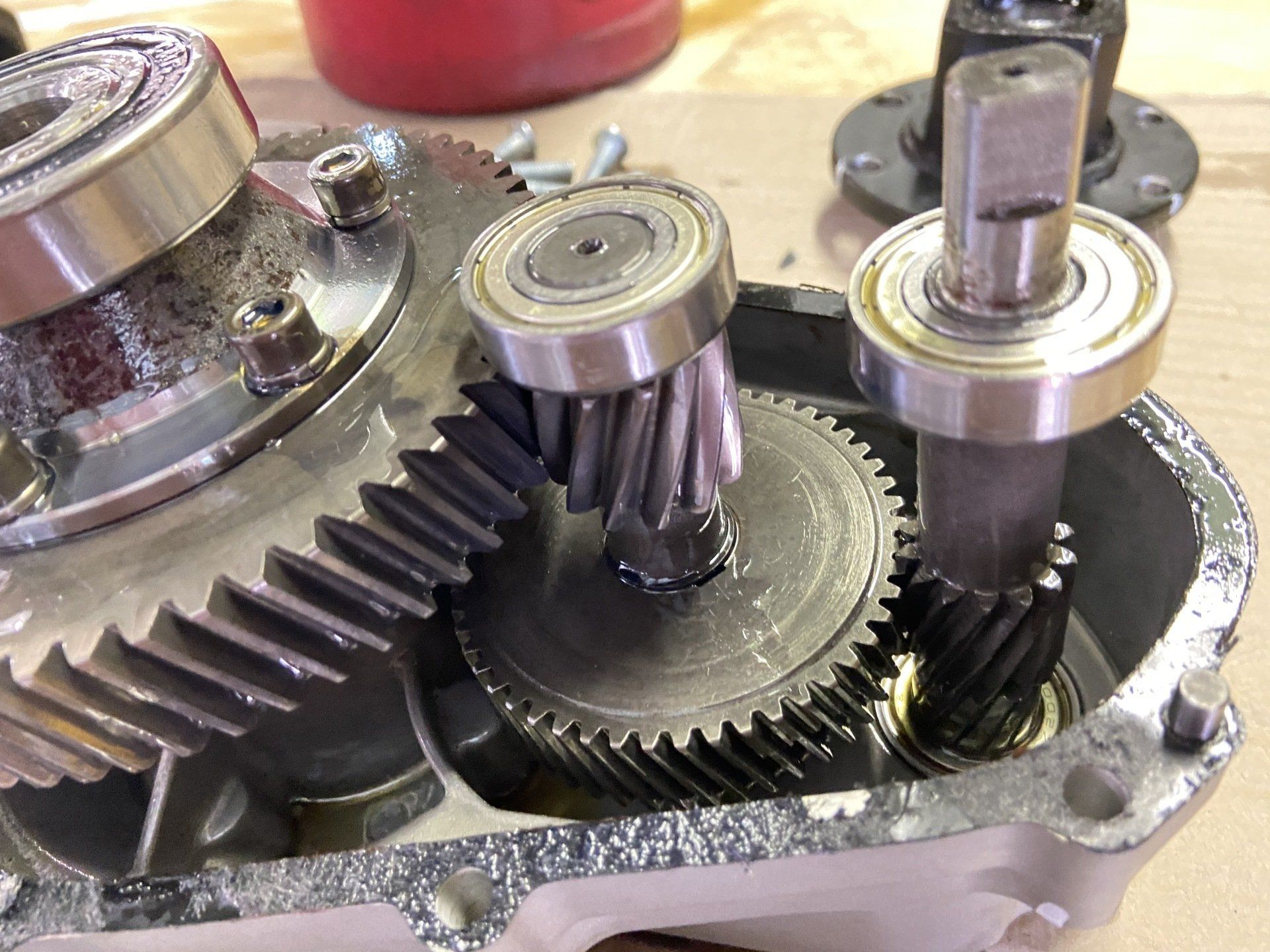 A close up of gears and bearings in a machine