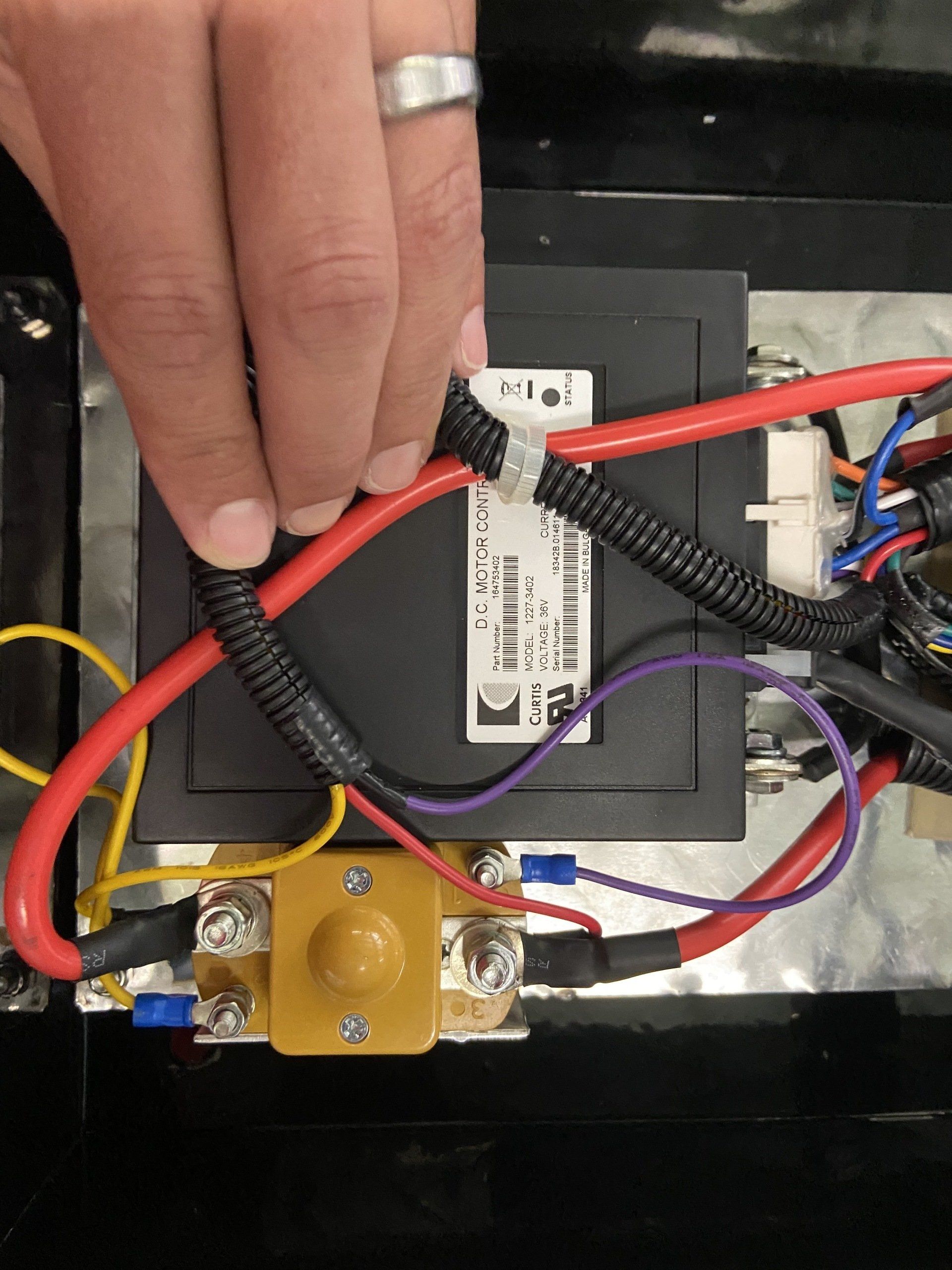 A close up of a person 's hand on a electrical device