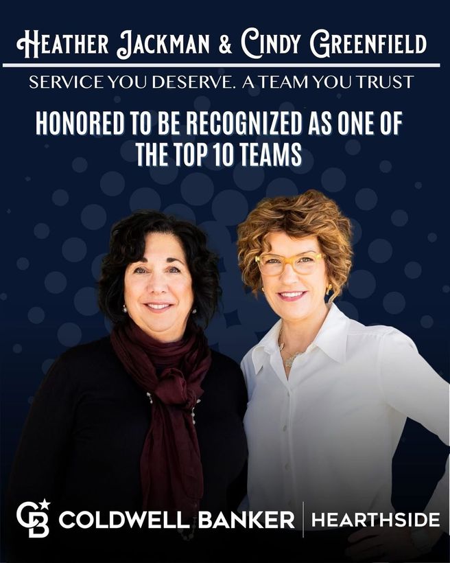  Heather Jackman & Cindy Greenfield, pose for a Coldwell Banker Hearthside , honored as a top 10 team.
