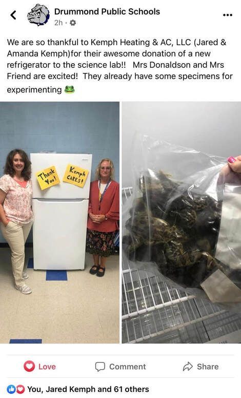 Two teachers with a new refrigerator, a bag of specimens for experiments.