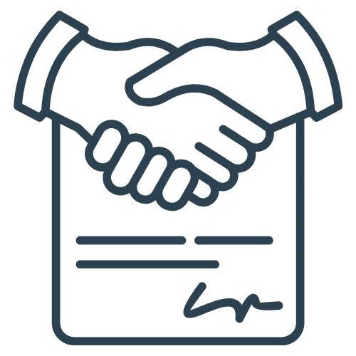 Hands shaking over a contract, symbolizing agreement and partnership.