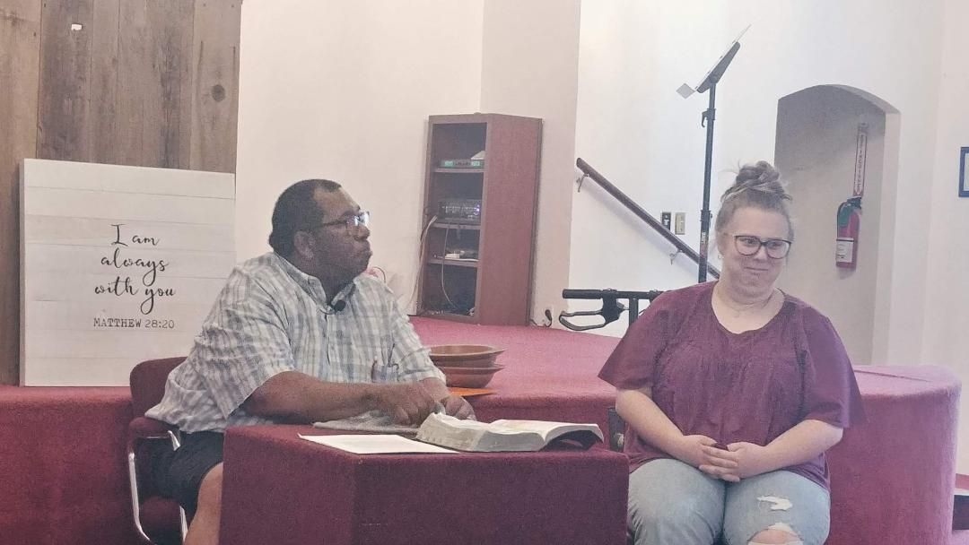 Man and Woman Working at Table