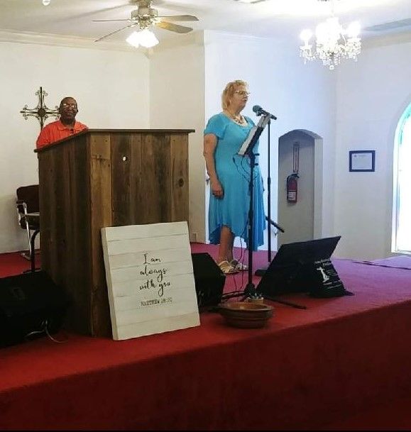 Woman Singing In Church