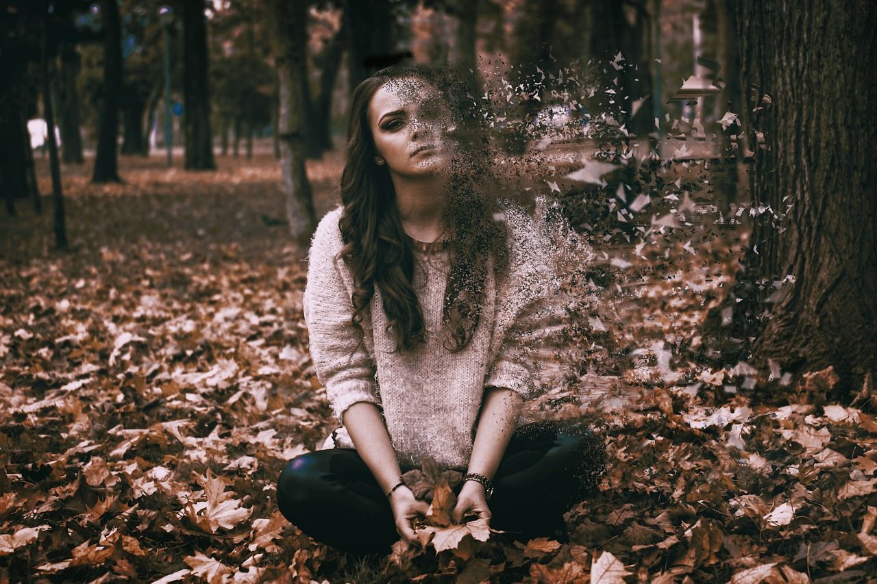 Woman Sitting Cross Leg in Forest