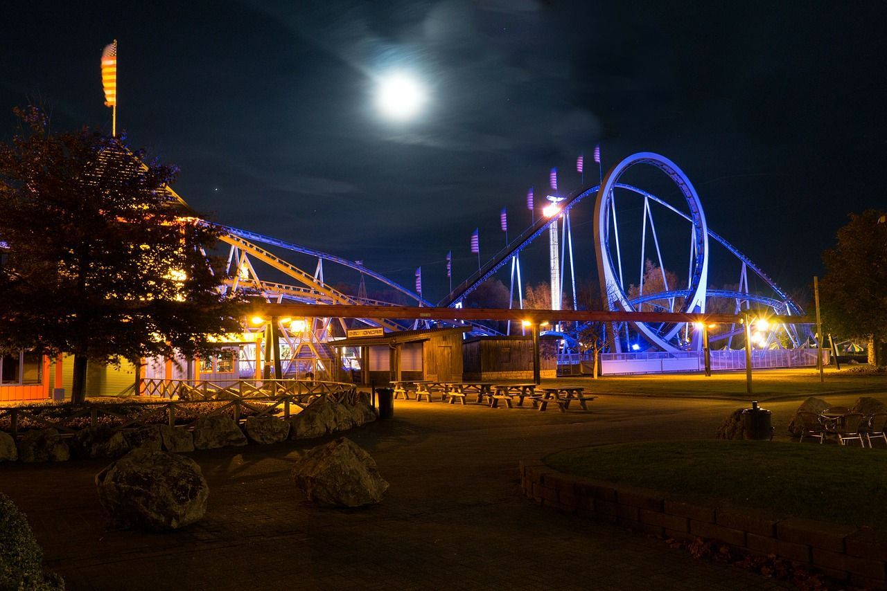Amusement Park Lit Up By Moonlight