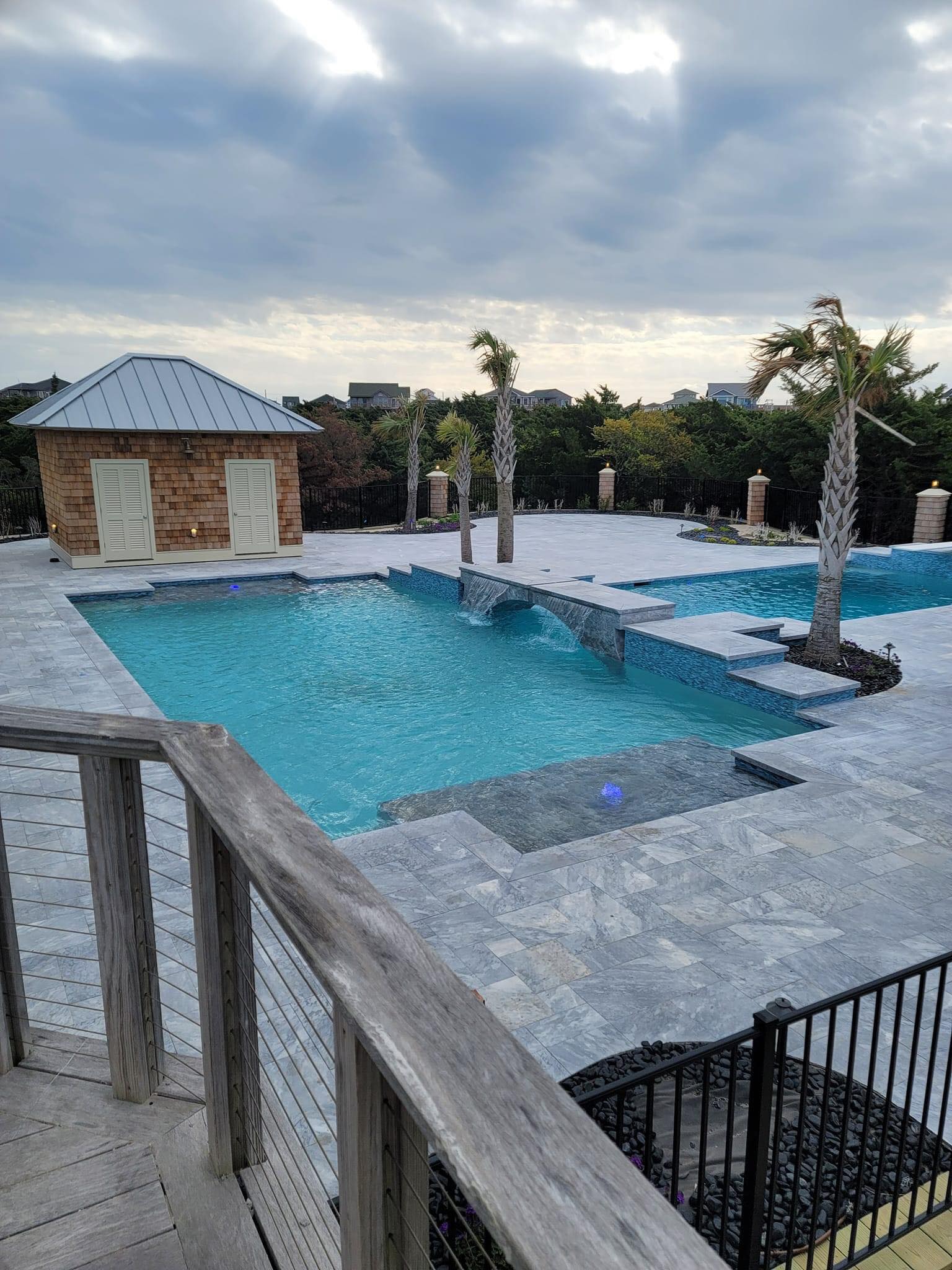 pool waterfall lighting by Shoreline Electrical OBX