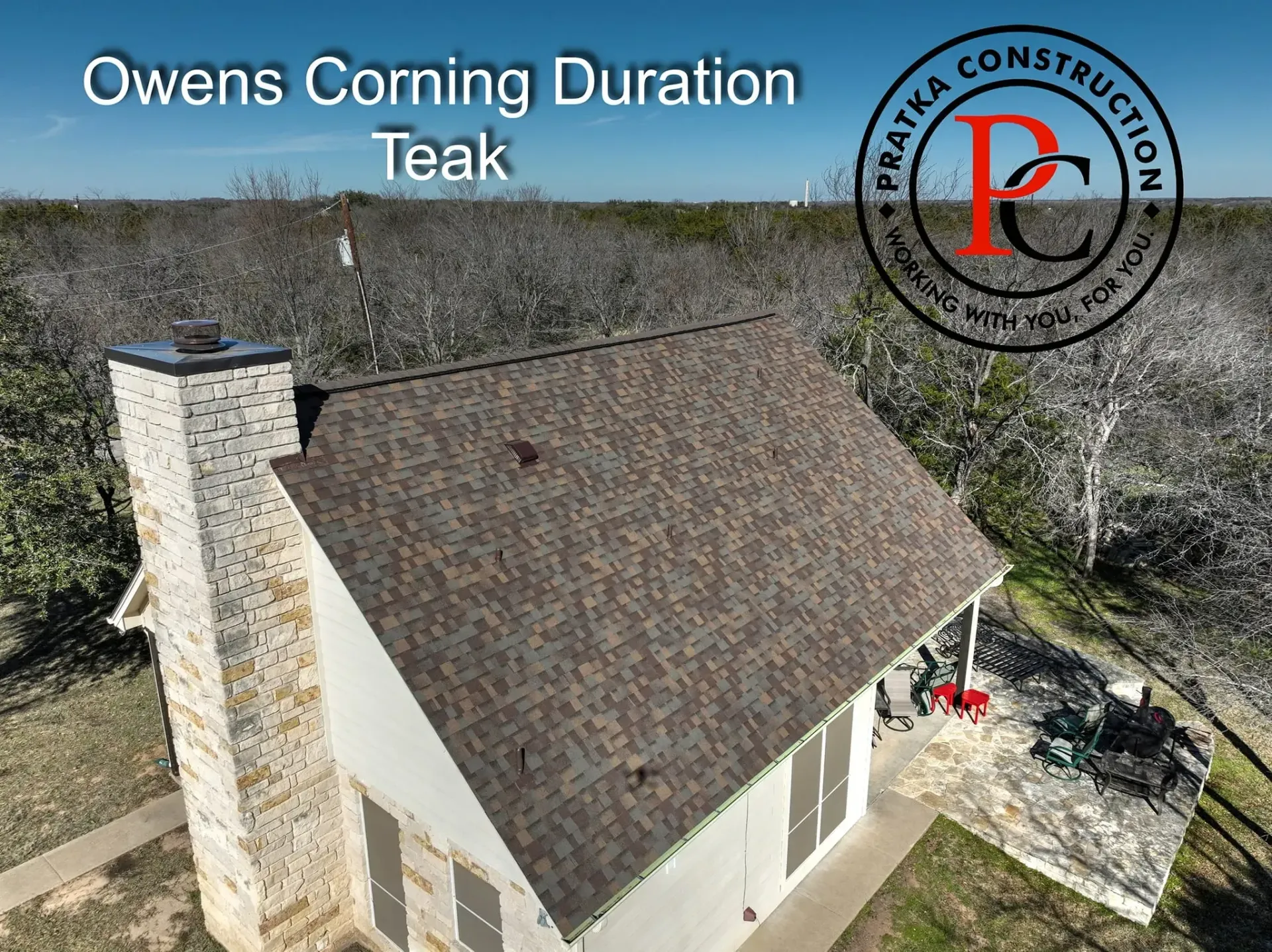 A house with a new Teak-colored roof by Owens Corning and Praska Construction.