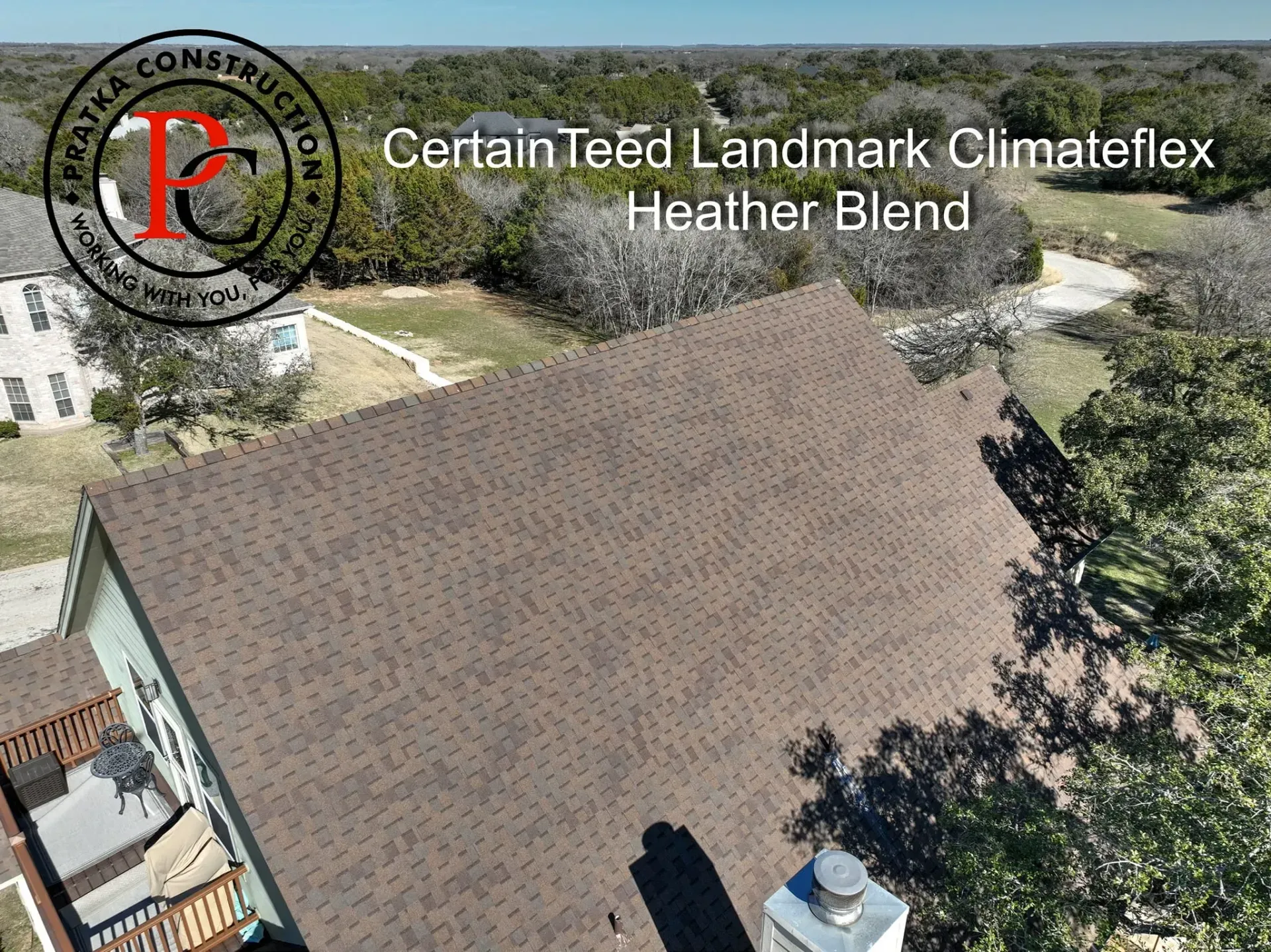 Overhead view of a house roof with brown CertainTeed Landmark Climateflex shingles, 