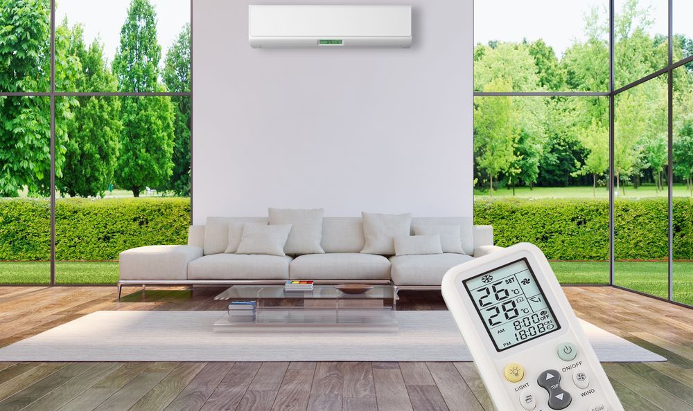 Adjusting Aircon's Thermostat Using Remote — Brod’s Refrigeration & Air Conditioning in Terramungamine, NSW