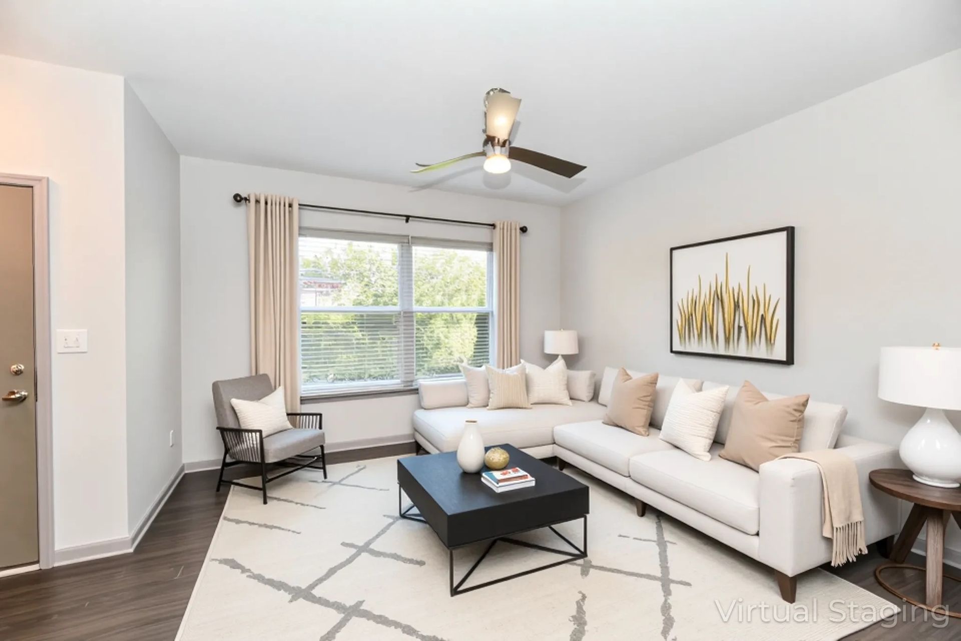 A living room filled with furniture and a fireplace.