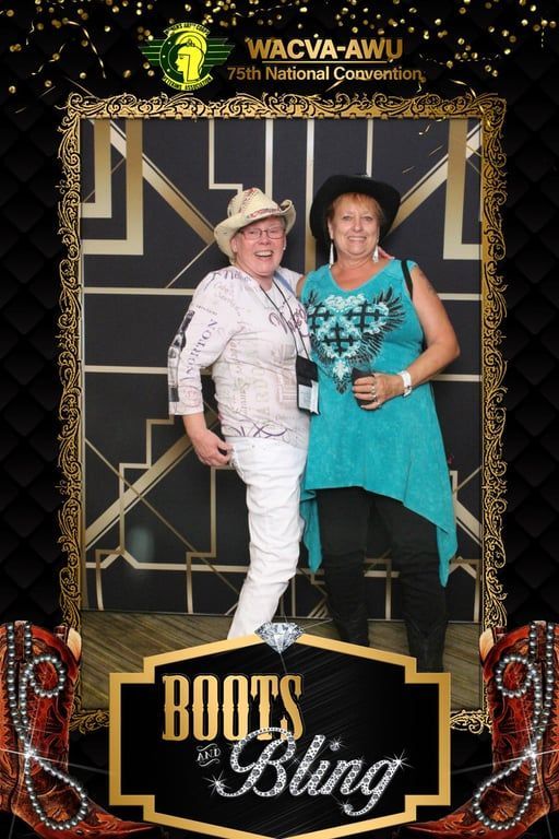 Two people smiling at a