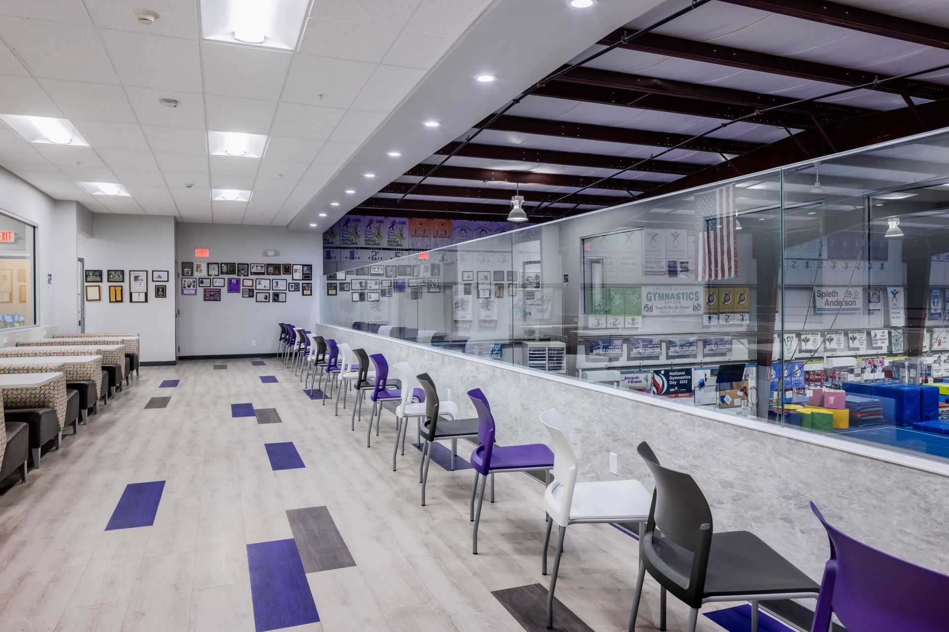 A large room with a lot of chairs and tables.