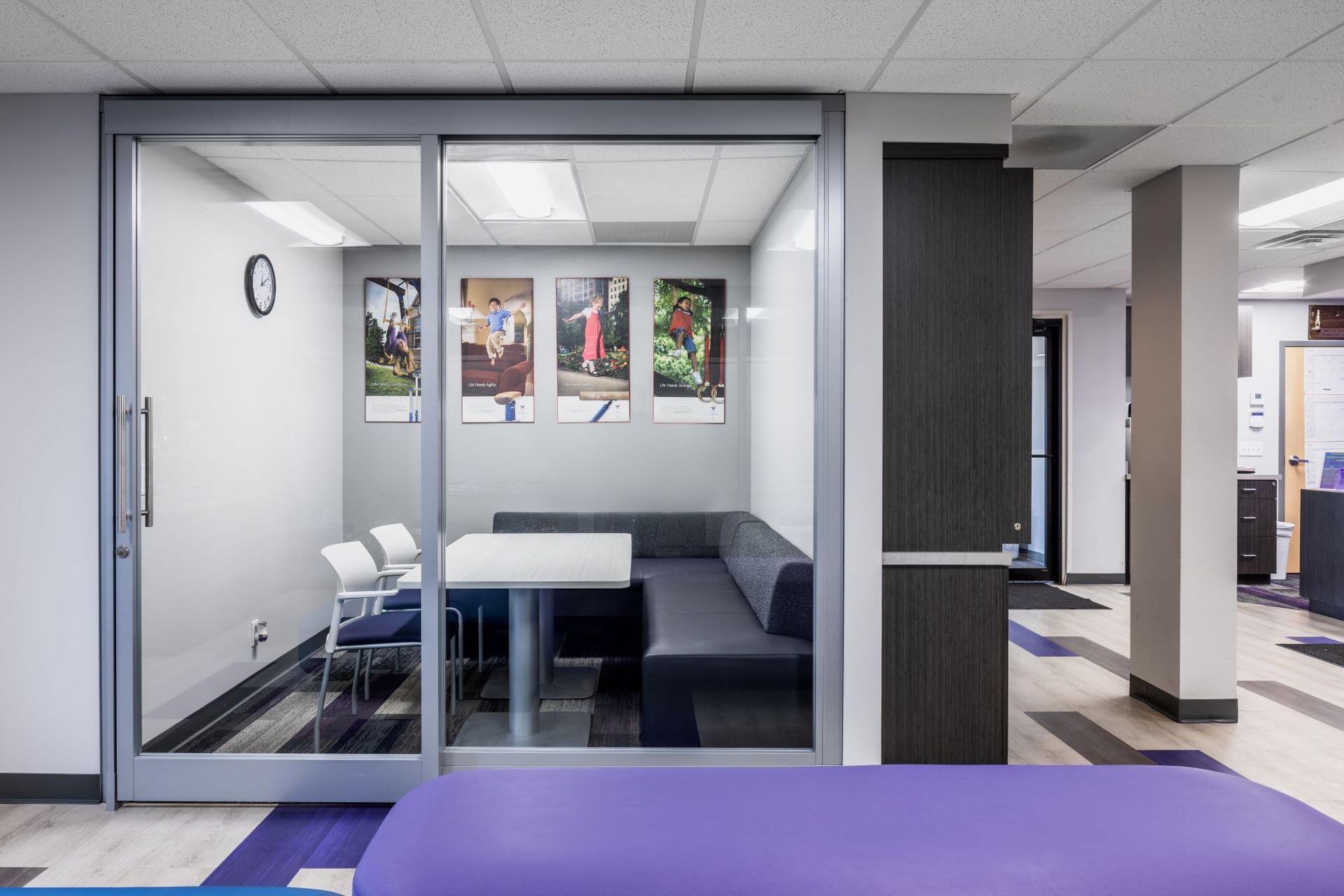 A room with a couch and a table in it