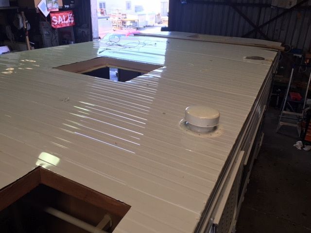 White Roof With Vent, Two Openings — Darren's Caravan Repairs in Warners Bay, NSW