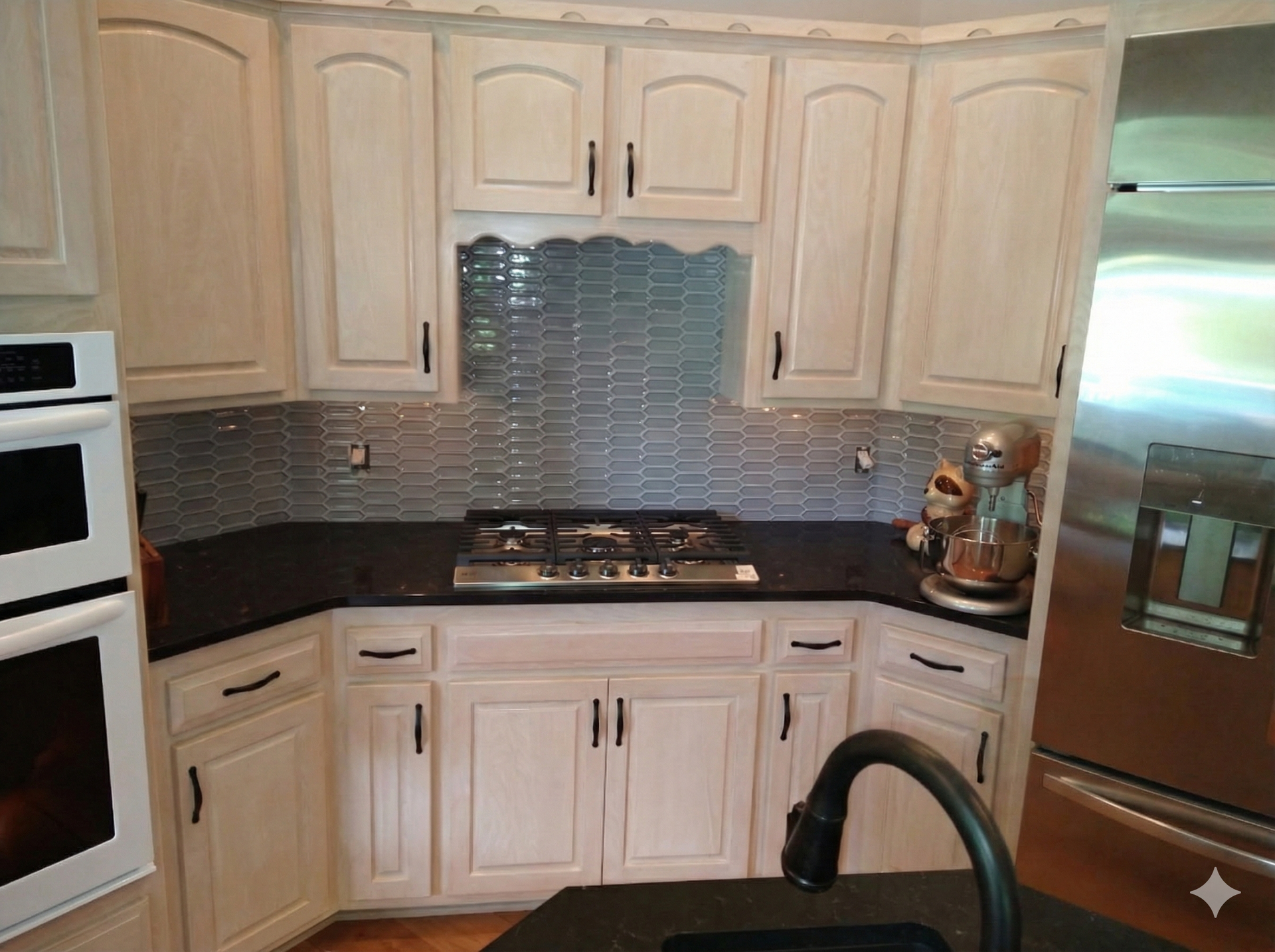 Wooden gazebo with table and chairs on a patio beside a pool.