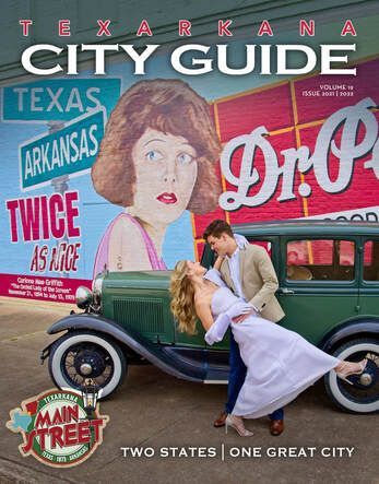 Texarkana City Guide cover: couple dancing in front of vintage car and mural, 