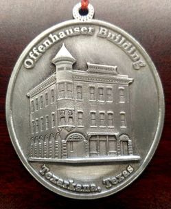 Ornament of the Offenhauser Building in Texarkana, Texas, with a silver-colored design.