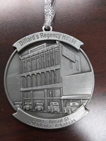 Silver ornament depicting Dillard's Regency House building in Little Rock, Arkansas.