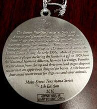 Medallion, engraved text: 