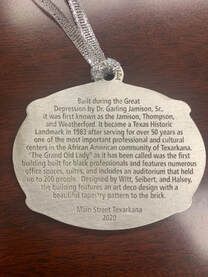 Oval ornament with inscription about the 