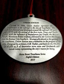 Oval ornament with text describing Union Station in Texarkana, Texas, built in 1902.