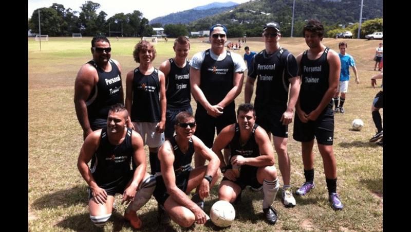 A Group of Men Are Posing for A Picture on A Field — Maxenergy Fitness In Smithfield, QLD