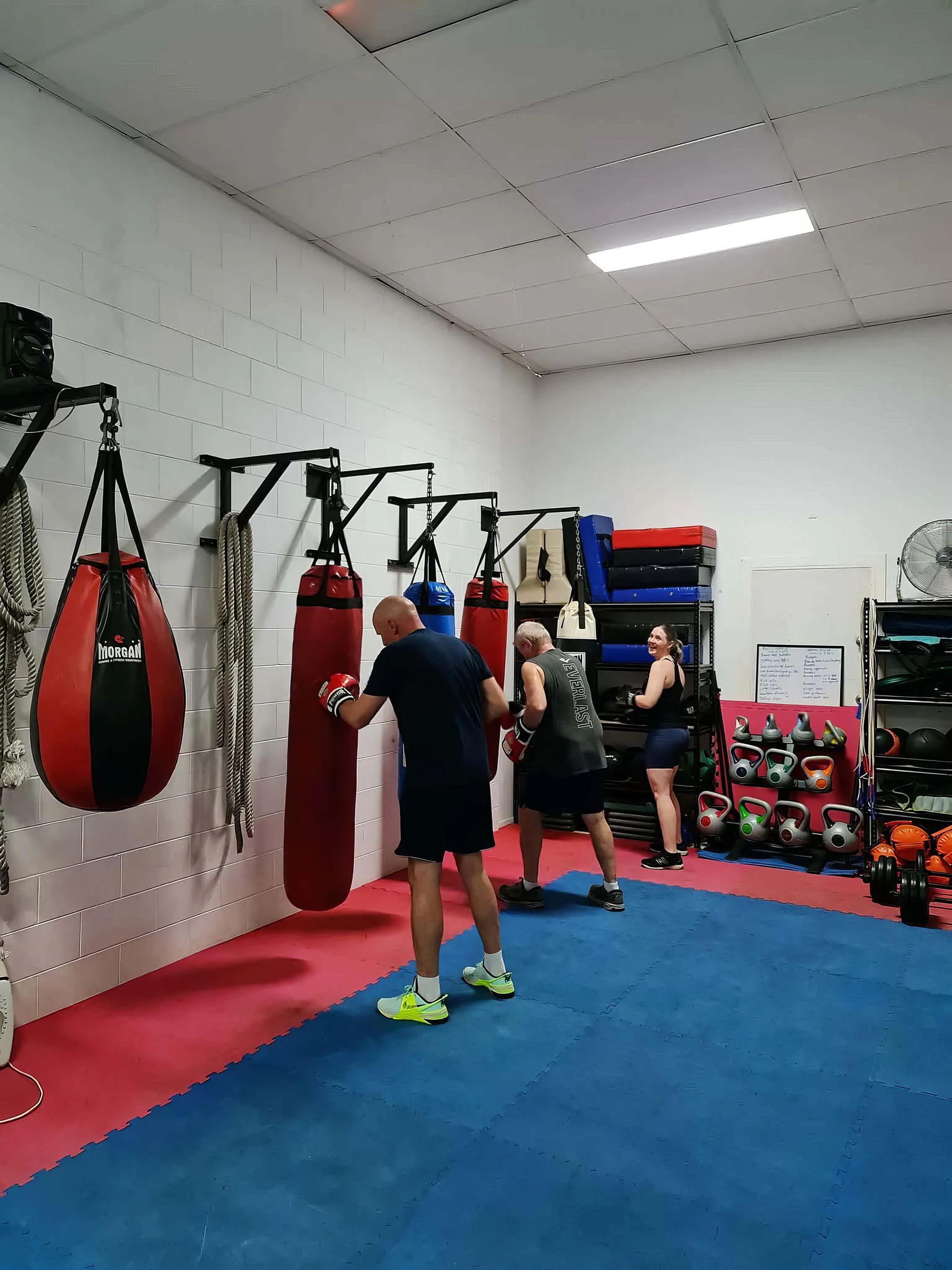 A Group of People Are Boxing in A Gym — Maxenergy Fitness In Smithfield, QLD