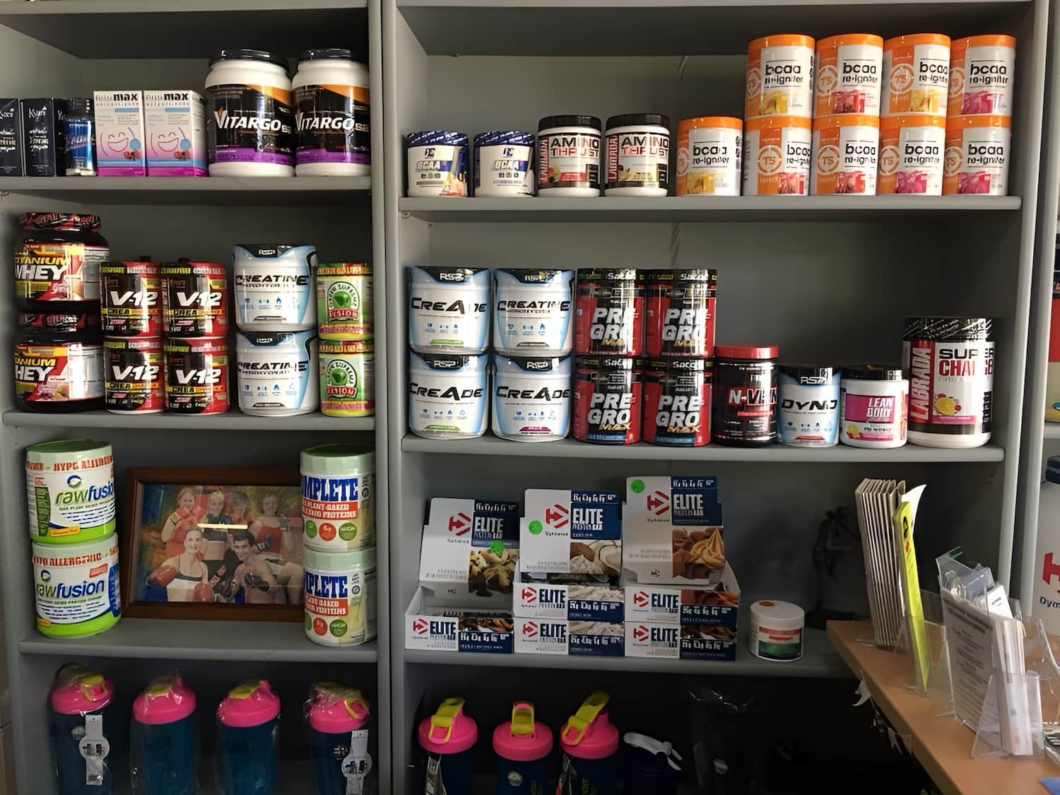 A Shelf Filled With Lots Of Different Types Of Protein Powders — Maxenergy Fitness In Smithfield, QLD