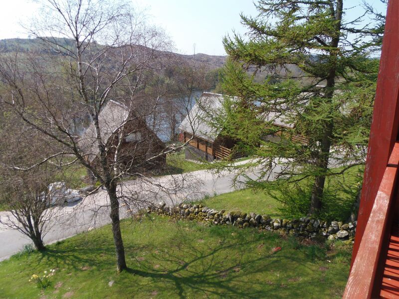 Galloway Lodges Red Kite Lodge balcony views overlooking Barnhourie and Colvend Golf course and Barend loch towards Colvend and Kippford