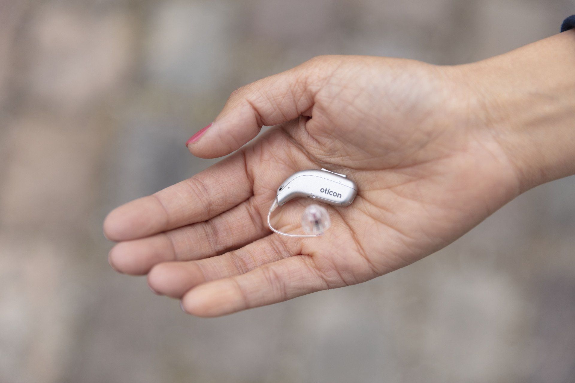 Hearing aid in hand