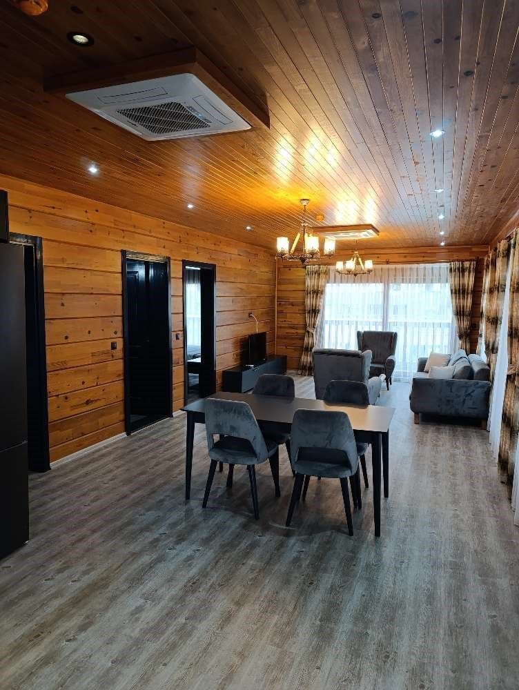 Our Wooden Suite room consists of 1 Living Room, 1 Bedroom, and 1 Children`s Room. The rooms are separated by a door.