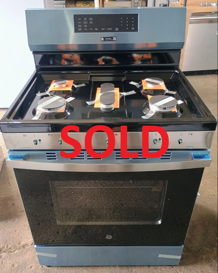 A gas range with a black cooktop and oven door. Stainless steel accents and blue accents.