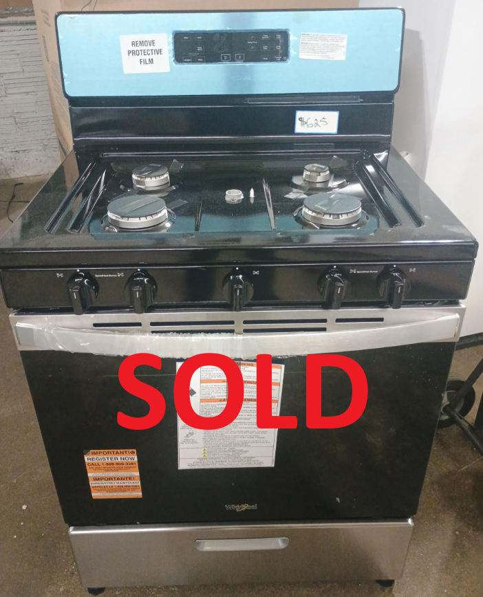 Black Whirlpool gas range with four burners, a blue backsplash, and a stainless steel drawer.